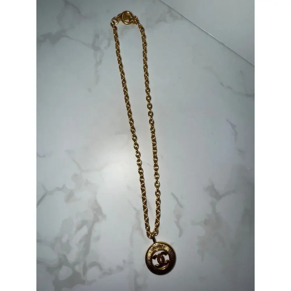 Chanel CC Sunburst Round Pendant Necklace - Gold-Tone